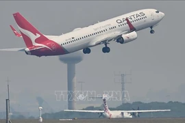 Máy bay của hãng hàng không Qantas Airways cất cánh từ sân bay Kingsford Smith ở Sydney, Australia. (Ảnh tư liệu: AFP/TTXVN)