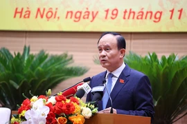 Chủ tịch Hội đồng Nhân dân thành phố Hà Nội Nguyễn Ngọc Tuấn phát biểu khai mạc kỳ họp. (Ảnh: Văn Điệp/TTXVN)