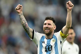 Niềm vui chiến thắng của tiền đạo Argentina Lionel Messi, sau khi đánh bại Croatia 3-0. (Ảnh: AFP/TTXVN)