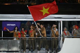 Hình ảnh Đoàn Thể thao Việt Nam tại Lễ Khai mạc Olympic Paris 2024. (Nguồn: AFP)