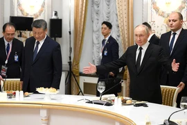 Tổng thống Nga Vladimir Putin và Tổng Bí thư, Chủ tịch Trung Quốc Tập Cận Bình tại Hội nghị BRICS (Nguồn: Kremlin)