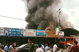 Hiện trường vụ cháy chợ Sóc Sơn (Ảnh: PV/Vietnam+)