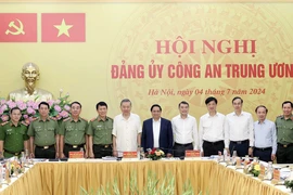 Chủ tịch nước Tô Lâm, Thủ tướng Phạm Minh Chính và các đại biểu. (Ảnh: Nhan Sáng/TTXVN)