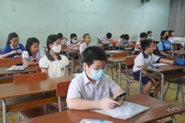 Thí sinh dự khảo sát vào lớp 6 Trường THCS - THPT Trần Đại Nghĩa. (Ảnh: Thu Hoài/TTXVN)