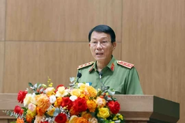Thượng tướng Lương Tam Quang, Ủy viên Trung ương Đảng, Bộ trưởng Bộ Công an phát biểu. (Ảnh: Phạm Kiên/TTXVN)