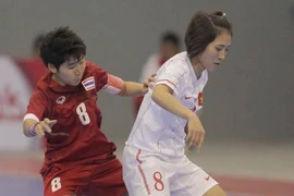 Nữ futsal Việt Nam không thể tạo nên bất ngờ. (Ảnh; Quang Nhựt/TTXVN)