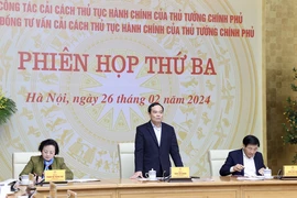 Phó Thủ tướng Trần Lưu Quang chủ trì phiên họp. (Ảnh: Lâm Khánh/TTXVN)