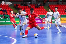 Tuyển Futsal Việt Nam (áo đỏ) chia điểm với Myanmar ở ngày ra quân. (Nguồn: AFC)