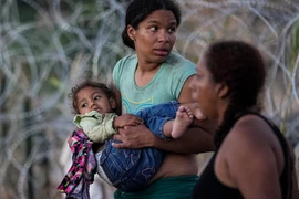 Một bức ảnh trong loạt tác phẩm nhiếp ảnh về dòng người nhập cư từ Colombia của AP. (Nguồn: AP)