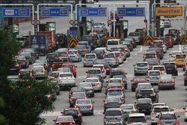 Ôtô tham gia giao thông trên đường phố Malaysia. (Nguồn: Business Today)