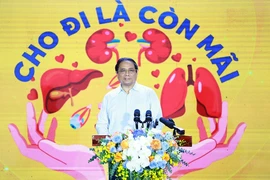 Thủ tướng Phạm Minh Chính phát động Chương trình "Đăng ký hiến tặng mô, tạng - Cho đi là còn mãi.” (Ảnh: Dương Giang/TTXVN)