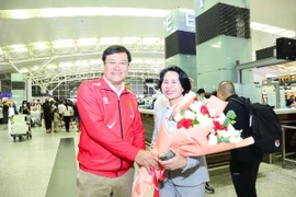 Ông Đặng Hà Việt (trái) và bà Lê Hoàng Yến, Phó Cục trưởng Cục Thể dục Thể thao. (Ảnh: Hoàng Linh/TTXVN)