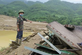 Căn nhà bị đổ sập sau lũ dữ tại Thôn làng Nủ, xã Phúc Khánh. (Ảnh: Hồng Ninh/TTXVN)