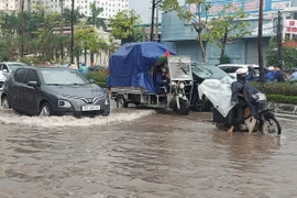 Mưa lớn gây ngập tại Hà Nội. (Ảnh: Văn Điệp/TTXVN)