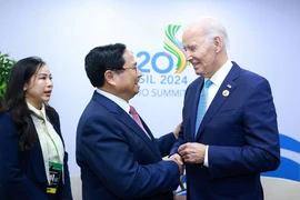 Thủ tướng Phạm Minh Chính gặp Tổng thống Hoa Kỳ Joe Biden tại Hội nghị thượng đỉnh G20. (Ảnh: Dương Giang/TTXVN)