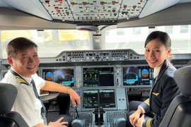 Vũ Mai Khanh hiện đang là Lái phụ bay bằng máy bay Airbus A350 (Đoàn bay 919 - Vietnam Airlines). (Ảnh: Việt Hùng/Vietnam+)
