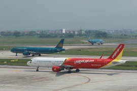 Máy bay của các hãng hàng không Việt Nam tại một sân bay nội địa. (Ảnh: Việt Hùng/Vietnam+)