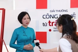 Tổng Giám đốc TTXVN Vũ Việt Trang trả lời phỏng vấn của phóng viên. (Ảnh: Tuấn Anh/TTXVN)