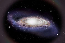 Quầng vật chất tối hiện tại của Dải Ngân hà có hình dáng hơi dẹt. (Nguồn: Phys)