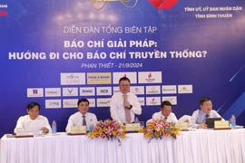 Chủ trì Diễn đàn Tổng Biên tập: Báo chí giải pháp - Hướng đi cho báo chí truyền thống. (Ảnh: Nguyễn Thanh/TTXVN)