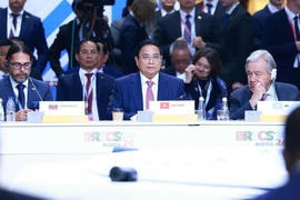 Thủ tướng Phạm Minh Chính phát biểu tại Phiên toàn thể Hội nghị các Nhà lãnh đạo Nhóm BRICS mở rộng. (Ảnh: Dương Giang/TTXVN)