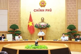 Thủ tướng Phạm Minh Chính chủ trì Phiên họp Chính phủ chuyên đề pháp luật. (Ảnh: Dương Giang/TTXVN)