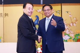 Thủ tướng Phạm Minh Chính tiếp ông Asakawa Masatsugu, Chủ tịch Ngân hàng Phát triển châu Á (ADB). (Ảnh: Dương Giang/TTXVN)