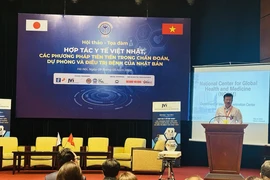 Ông Vũ Mạnh Cường, Giám đốc Trung tâm Truyền thông - Giáo dục Sức khỏe Trung ương (Bộ Y tế) phát biểu tại Hội thảo. (Ảnh: PV/Vietnam+)