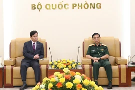 Đại tướng Phan Văn Giang và Ngài Kim Seon Ho tại buổi tiếp. (Ảnh: Hồng Pha/TTXVN phát)