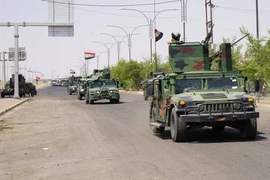 Lực lượng an ninh Iraq tuần tra tại thành phố Kirkuk . (Ảnh: AFP/TTXVN)
