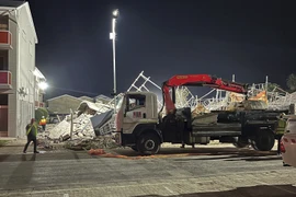 Hiện trường vụ sập tòa nhà ở thành phố George, Nam Phi. (Ảnh: AFP/TTXVN)