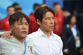 Huấn luyện viên Akira Nishino (phải) của đội tuyển Nhật Bản trong trận đấu với Colombia ở bảng H World Cup 2018 diễn ra tại Saransk, Nga ngày 19/6 vừa qua. (Ảnh: THX/TTXVN) 