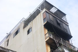Hiện trạng ngôi nhà số 207 Định Công Hạ (Hoàng Mai, Hà Nội) sau vụ cháy thương tâm. (Ảnh: Hoài Nam/Vietnam+)