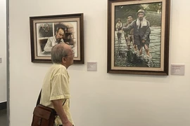 Triển lãm giới thiệu 55 bức tranh về Bác Hồ của họa sỹ Đào Trọng Lý. (Ảnh: PV/Vietnam+)