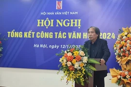 Chủ tịch Hội Nhà văn Việt Nam Nguyễn Quang Thiều phát biểu tại Hội nghị Tổng kết công tác văn học năm 2024. (Ảnh: PV/Vietnam+)