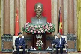 Chủ tịch nước Tô Lâm tiếp Chủ tịch Chính hiệp Trung Quốc Vương Hộ Ninh. (Ảnh: Nhan Sáng/TTXVN)