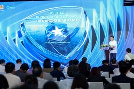 Thượng tướng Lương Tam Quang, Ủy viên Trung ương Đảng, Thứ trưởng Bộ Công an, Chủ tịch Hiệp hội An ninh mạng Quốc gia phát biểu tại sự kiện. (Ảnh: Minh Sơn/Vietnam+)