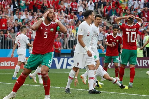 Maroc (áo đỏ) là 1 trong 3 đội tuyển đã bị loại khỏi World Cup 2018. (Nguồn: Reuters)
