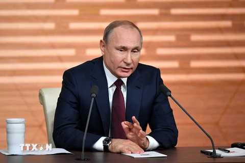 Tổng thống Vladimir Putin trong buổi họp báo cuối năm. (Ảnh: AFP/TTXVN)