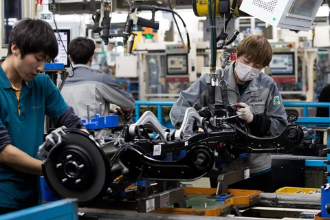 Công nhân làm việc trong một nhà máy sản xuất ôtô của Hyundai. (Ảnh: Bloomberg)