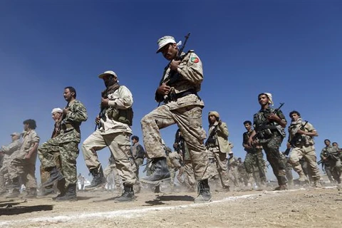 Các tay súng Houthi tại Sanaa, Yemen. (Ảnh: AFP/TTXVN)