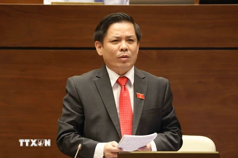 Bộ trưởng Bộ Giao thông Vận tải Nguyễn Văn Thể trả lời chất vấn. (Ảnh: Phương Hoa/TTXVN)