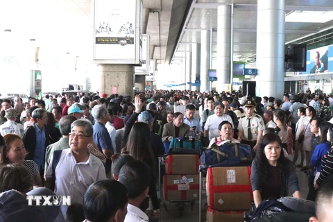 Khu vực đón khách sân ga quốc tế của Sân bay Tân Sơn Nhất. (Ảnh: Xuân Khu/TTXVN)