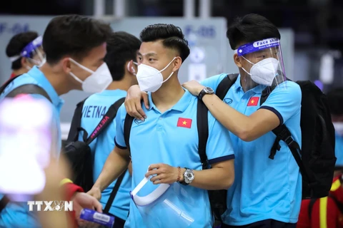 Lần đầu tiên tham dự vòng loại cuối cùng World Cup, các tuyển thủ Việt Nam không giấu được tâm trạng háo hức. (Ảnh: Thành Đạt/TTXVN)
