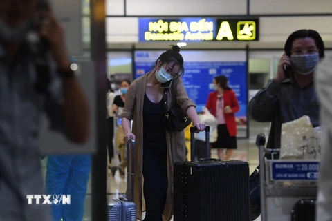 [Photo] Chuyến bay thương mại đầu tiên chở khách từ TP.HCM về Hà Nội
