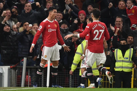 Ronaldo (trái) tỏa sáng mang chiến thắng về cho Manchester United. (Nguồn: Getty Images)