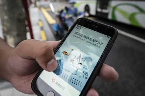 Ứng dụng đặt xe của Didi Global Inc trên điện thoại tại Trung Quốc. (Nguồn: Blooberg)