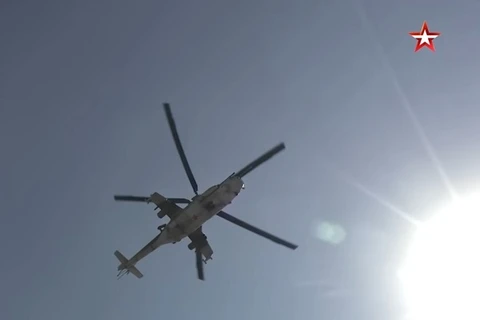 Trực thăng vũ trang Mi-24 tham gia cuộc tập trận. (Ảnh: Zvezda TV)