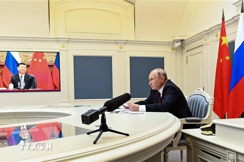 Tổng thống Nga Vladimir Putin tại cuộc họp trực tuyến với Chủ tịch Trung Quốc Tập Cận Bình ngày 28/6/2021. (Ảnh: AFP/TTXVN)