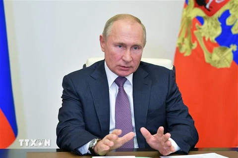 Tổng thống Vladimir Putin tại cuộc họp trực tuyến ở Moskva, Nga. (Ảnh: AFP/TTXVN)